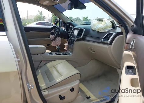 2014 Jeep Grand Cherokee Overland z USA, uszkodzony, nr VIN 1C4RJFCGXEC279320